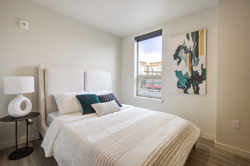 Bedroom with natural lighting and high ceilings
