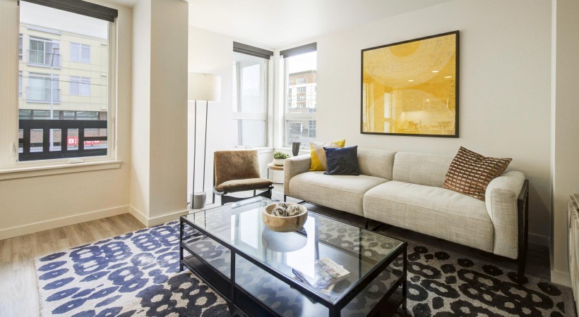 a living room with a couch and a coffee table