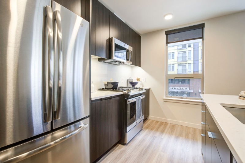 a kitchen with stainless steel appliances