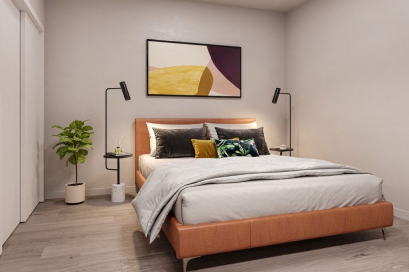 Bedroom with natural lighting and high ceilings