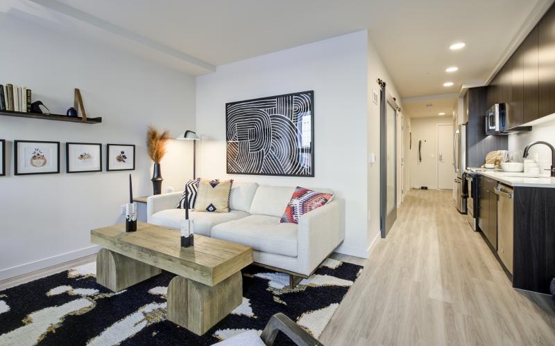 a living room with a couch and a coffee table