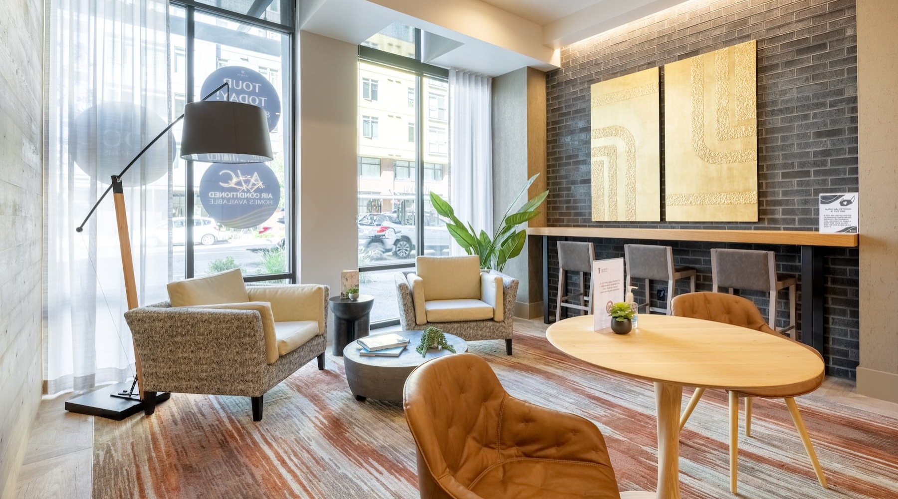 a clubroom with tables and chairs