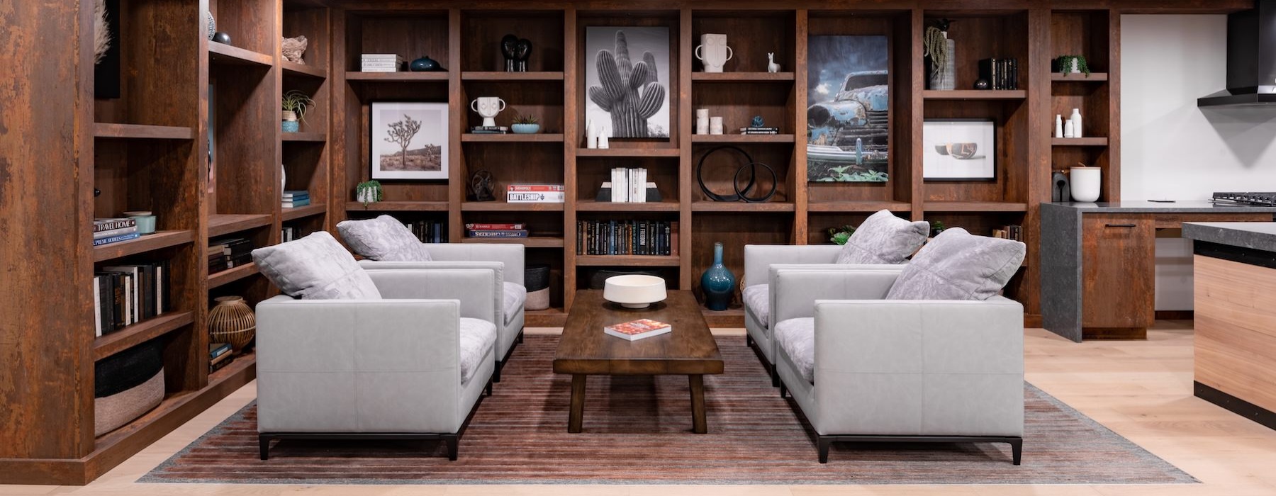 a lounge with chairs and a coffee table