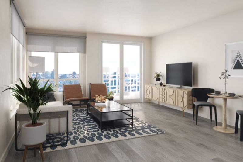 a living room with a tv and chairs