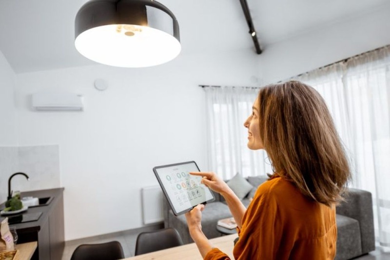 a person holding an ipad