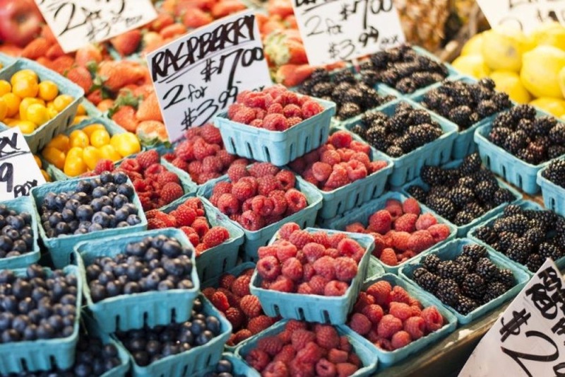 a bunch of fruits in a market
