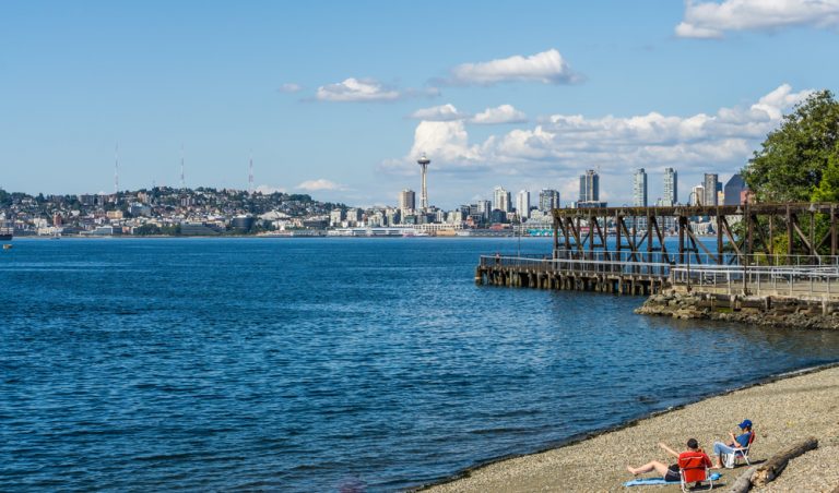 People spending the day in the Seattle bay by the pier