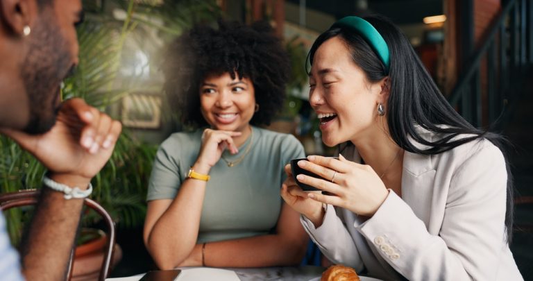 friends talking at coffee store